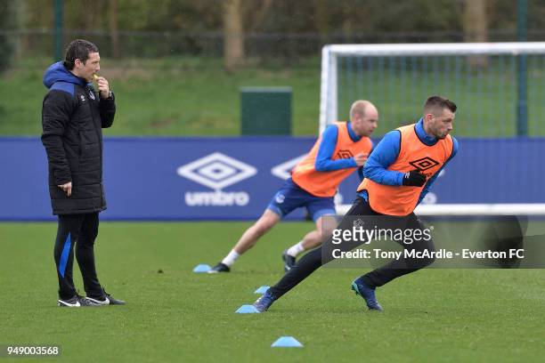 Ryland Morgans watches over Davy Klaassen and Morgan Schneiderlin during the Everton FC training session at USM Finch Farm on April 17, 2018 in...