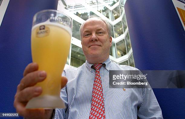 Tony Froggatt, chief executive of Scottish & Newcastle Plc poses after a press conference in London, Tuesday, August 3, 2004. Britain's biggest...