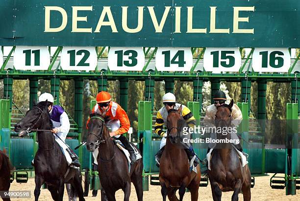 Horse race begins at the Deauville horse auction, Tuesday, August 23, 2005. The Deauville thoroughbred auction, a French tradition that has produced...