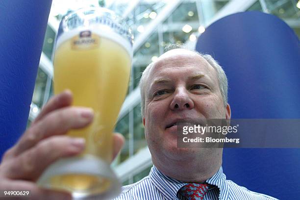 Tony Froggatt, chief executive of Scottish & Newcastle Plc poses after a press conference in London, Tuesday, August 3, 2004. Britain's biggest...