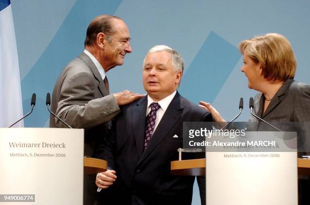 French President Jacques Chirac, Poland's President Lech Kaczynski and German Chancellor Angela Merkel.