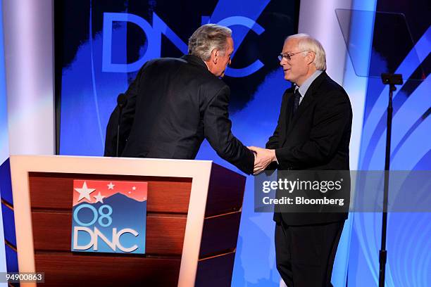 Tom Harkin, a Democratic senator from Iowa, left, welcomes Jim Leach, a former Republican representative from Iowa, during day one of the 2008...