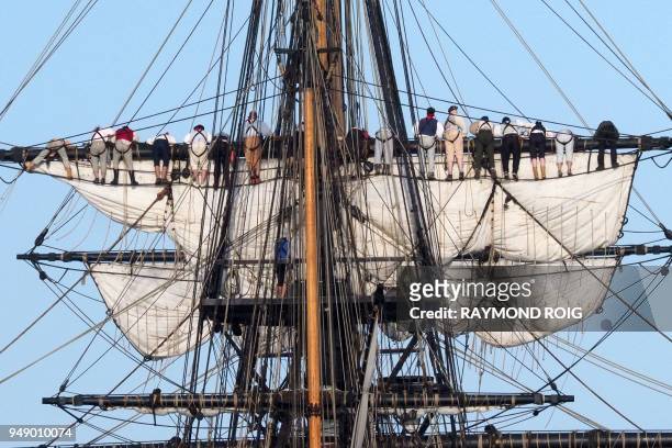 The ships' company of "The Hermione" stand on the mast as she arrives in Port-Vendres on April 20 for a two-day stopover. - The Hermione is a 32-gun...