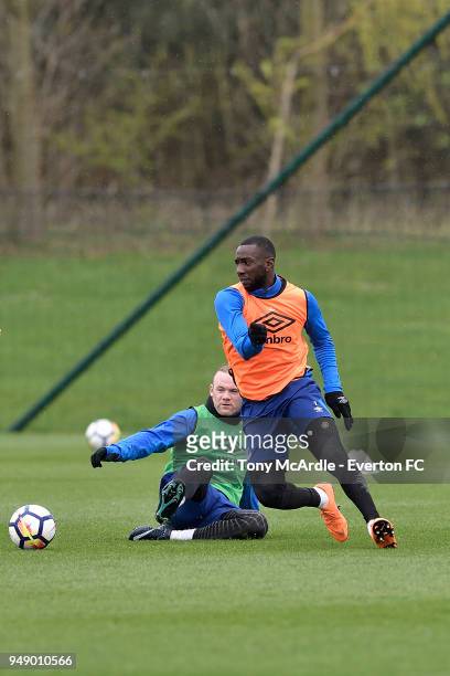 Wayne Rooney and Yannick Bolasie challenge for the ball during the Everton FC training session at USM Finch Farm on April 17, 2018 in Halewood,...
