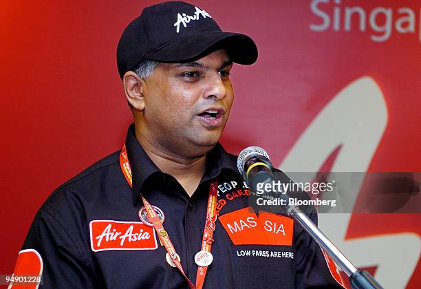 Tony Fernandes, group chief executive officer of AirAsia Bhd., speaks at a welcoming ceremony at Changi Airport for the airline's inaugural flight...