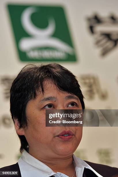China Mengniu Dairy Co. Vice President Lu Jun speaks to reporters at a press conference Tuesday, August 23, 2005 in Hong Kong, China. China's biggest...