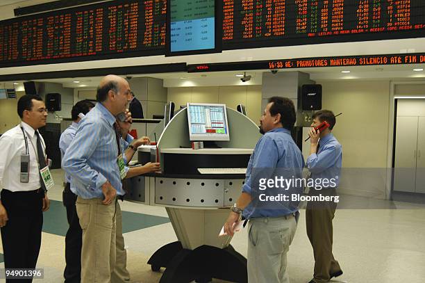 Traders work at the Bolsa de Valores de Sao Paulo, or Bovespa on Monday, August 22, 2005 in Sao Paulo, Brazil. Brazilian stocks, bonds and currency...