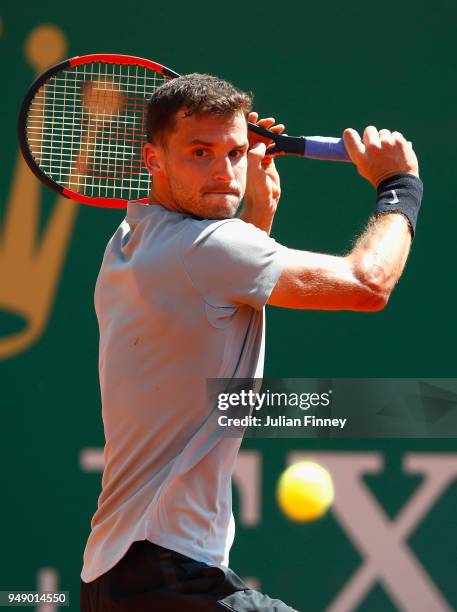 Grigor Dimitrov of Bulgaria in action in his singles match against David Goffin of Belgium during say six of ATP Masters Series: Monte Carlo Rolex...