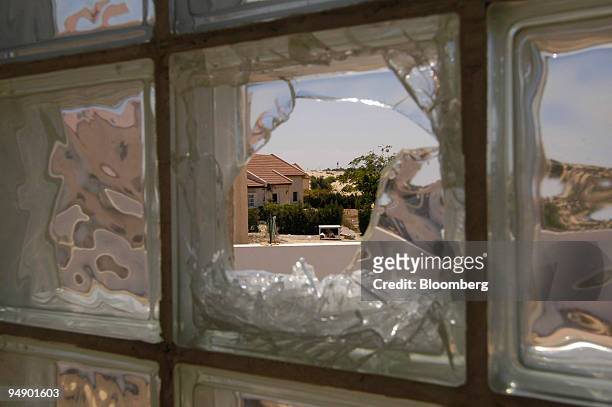 Former settlers houses are seen prior to demolition in the Gaza Strip settlement of Pe'at Sadeh, Sunday, August 21, 2005. Israeli forces removed more...