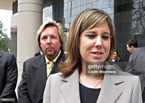 Eva Rowe, whose parents were killed in the 2005 British Petroleum Texas City refinery blast, is followed by her attorney Brent Coon as she enters the...