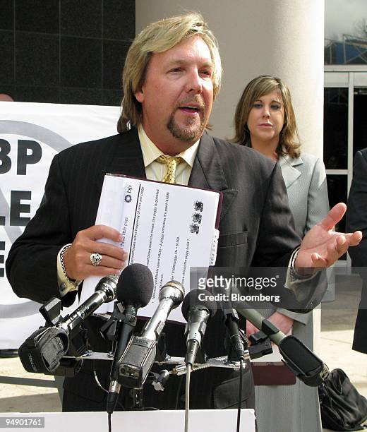 Plaintiffs' attorney Brent Coon displays a British Petroleum courtroom exhibit during a news conference outside the federal courthouse in Houston,...