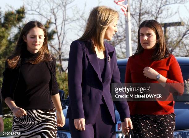 Caroline Kennedy Schlossberg walks with daughters Rose, left, and Tatiana outside the John F. Kennedy Libray in Boston.