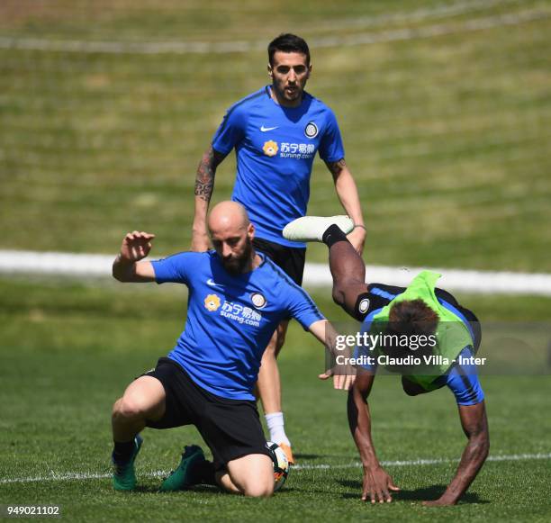 Borja Valero and Yann Karamoh of FC Internazionale compete for the ball during the FC Internazionale training session at the club's training ground...