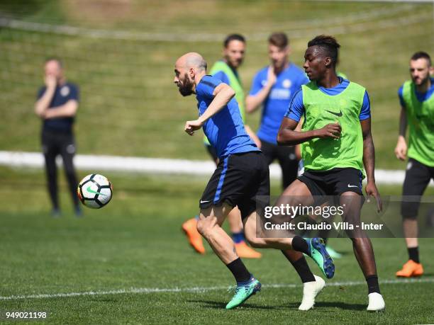 Borja Valero and Yann Karamoh of FC Internazionale compete for the ball during the FC Internazionale training session at the club's training ground...