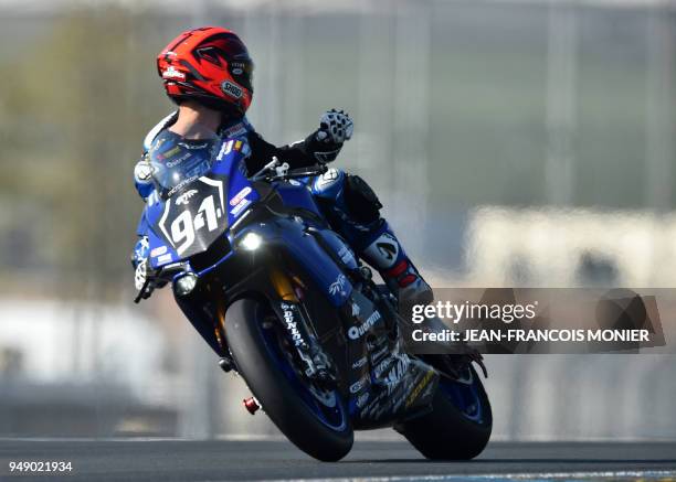 French rider Mike di Meglio on his Yamaha GMT Formula EWC N°94 competes and gestures during a qualifying practice session, in Le Mans, northwestern...