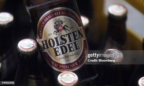 Bottles of Holsten Beer seen in Hamburg, Germany, Tuesday, January 20, 2004. Carlsberg A/S, the world's fifth-largest brewer, raised its forecast for...