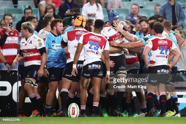 Scuffle breaks out at full time during the round 10 Super Rugby match between the Waratahs and the Lions at Allianz Stadium on April 20, 2018 in...