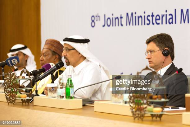 Khalid al-Falih, Saudi Arabia's energy minister, center, speaks during a news conference with Alexander Novak, Russia's energy minister, at the Joint...