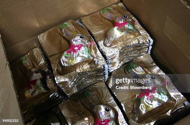 Chocolate bunnies sit after being wrapped at the kosher certified Madelaine Chocolate Novelties, Inc. Factory in the Queens borough of New York,...