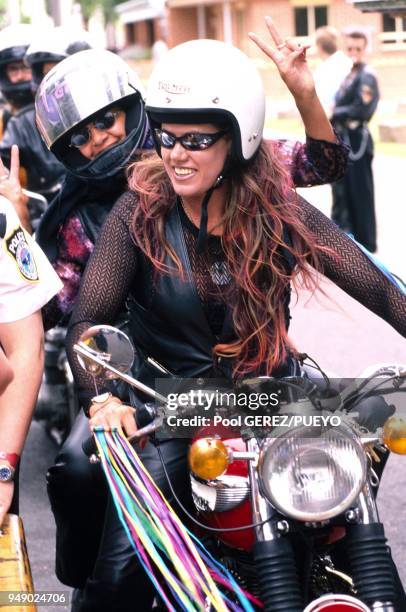 "Dikes on Bikes parade" of 400 Lesbians & their motorbikes driving down the streets of the city.
