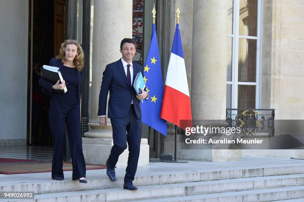 French Justice Minister Nicole Belloubet and Secretary of State to the Prime Minister and Government Spokesman Benjamin Griveaux leave the Elysee...