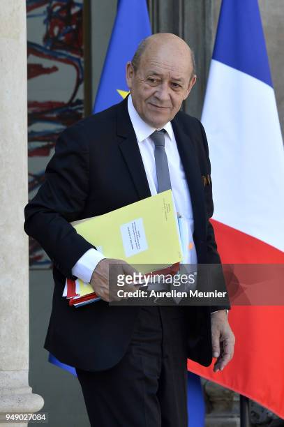French Minister of Foreign Affairs Jean-Yves Le Drian leaves the Elysee Palace after the weekly cabinet meeting on April 20, 2018 in Paris, France.