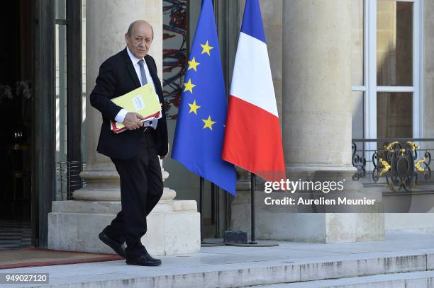 French Minister of Foreign Affairs Jean-Yves Le Drian leaves the Elysee Palace after the weekly cabinet meeting on April 20, 2018 in Paris, France.