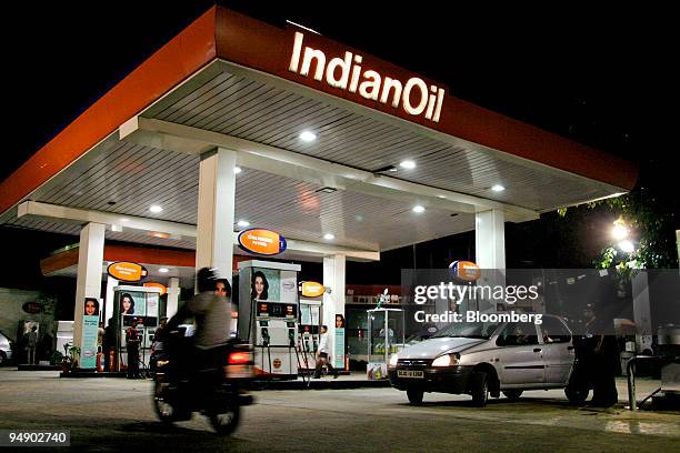 An Indian Oil Corporation petrol station is pictured in New Delhi, India Wednesday, August 17, 2005. India's state-run refiners, prohibited from...