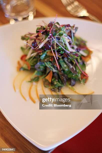 Watercress and Asian pear salad is arranged at Chop Suey in New York, U.S., on Saturday, Jan. 26, 2008. Irony might be the next logical restaurant...