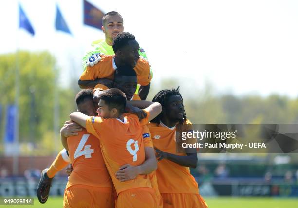 Porto players celebrate their side's first goal during the UEFA Youth League Semi Final between Chelsea FC and FC Porto at Colovray Sports Centre on...
