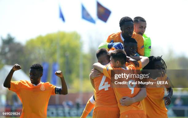 Porto players celebrate their side's first goal during the UEFA Youth League Semi Final between Chelsea FC and FC Porto at Colovray Sports Centre on...