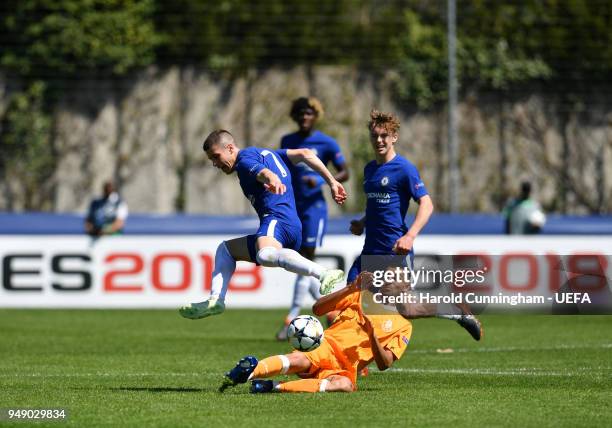 Harvey St Clair of Chelsea is tackled by Santiago Irala of Porto during the UEFA Youth League Semi Final between Chelsea FC and FC Porto at Colovray...