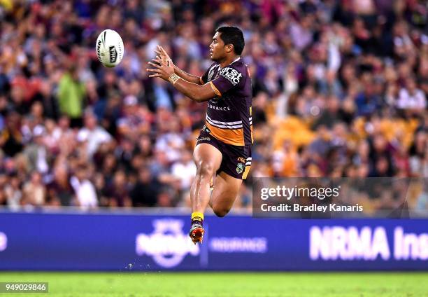 Anthony Milford of the Broncos jumps to catch the ball during the round seven NRL match between the Brisbane Broncos and the Melbourne Storm at...