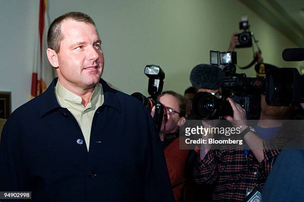 Roger Clemens, left, a former pitcher with Major League Baseball's New York Yankees, arrives for a meeting with Representative Tom Davis, a Democrat...