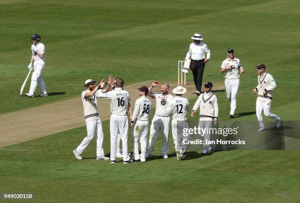 Kent players celebrate taking the wicket of Nathan Rimmington of Durham during day one of the SpecSavers County Championship Division Two match...