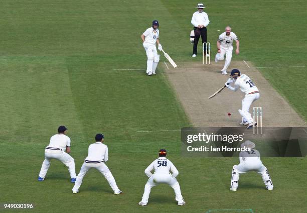 James Weighell of Durham plays a delivery into the slips during day one of the SpecSavers County Championship Division Two match between Durham and...