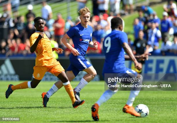 Moreto Cassamá of Porto in action against Daishawn Redan and Luke McCormick of Chelsea during the UEFA Youth League Semi Final between Chelsea FC and...