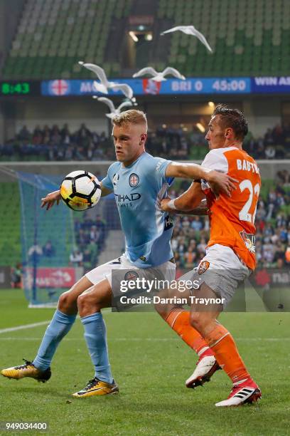 Nathaniel Atkinson of Melbourne City and Eric Bautheac of the Roar compete during the A-League Elimination Final match between the Melbourne City and...