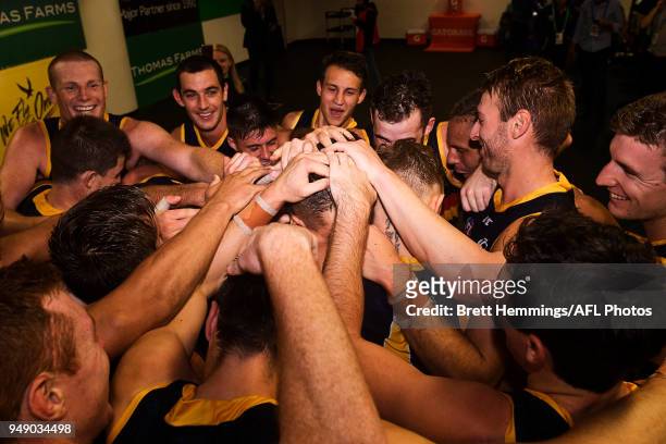 Crows players celebrate victory during the round five AFL match between the Sydney Swans and the Adelaide Crows at Sydney Cricket Ground on April 20,...
