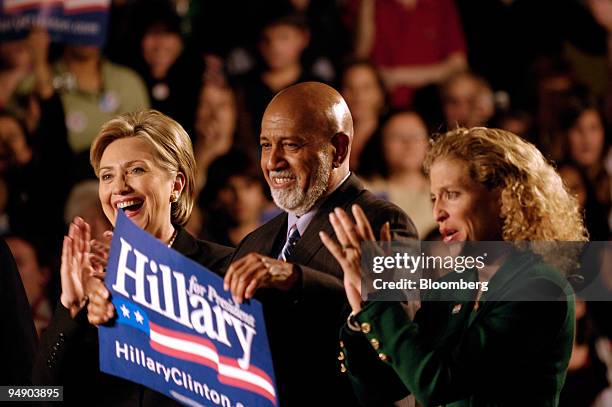 Hillary Clinton, U.S. Senator from New York and 2008 Democratic presidential candidate, left, is joined by Alcee Hastings, center, and Debbie...