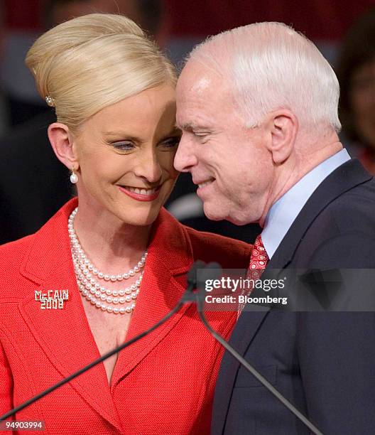 John McCain, U.S. Senator from Arizona and 2008 Republican candidate, right, and wife Cindy smile during the Super Tuesday election night rally at...