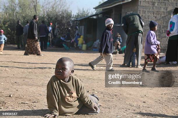 Child from the Luo tribe waits to be taken to a safe place by police in Naivasha, Kenya, on Tuesday, Jan. 29, 2008. Kenya's main opposition party...