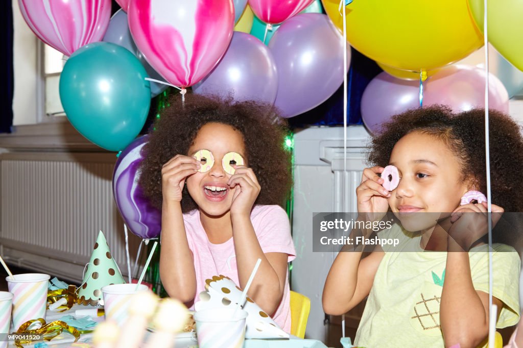 Portrait of two girls at a party