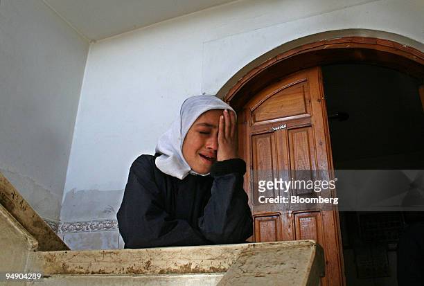 Palestinian relative of Bakr Abu Regala reacts at his funeral in Rafah City, southern Gaza Strip, on Tuesday, Feb. 5, 2008. Israeli soldiers killed...