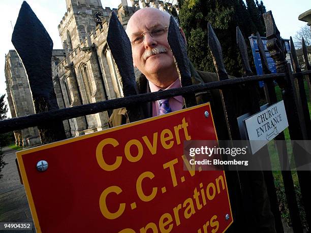 Reverend Francis Loftus, curate of Hemingbrough Minster, poses outside the church in Hemingbrough, North Yorkshire, U.K., on Monday, Jan. 28, 2008....