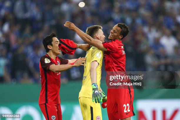 Makoto Hasebe of Eintracht Frankfurt , Lukas Hradecky of Eintracht Frankfurt and Timmy Chandler of Eintracht Frankfurt celebrate victory after the...