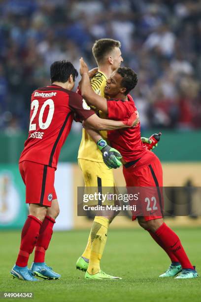 Makoto Hasebe of Eintracht Frankfurt , Lukas Hradecky of Eintracht Frankfurt and Timmy Chandler of Eintracht Frankfurt celebrate victory after the...
