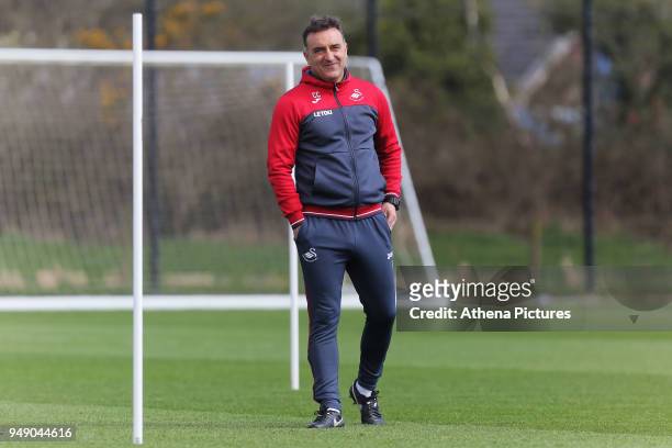 Manager Carlos Carvalhal watches his players train during the Swansea City Training at The Fairwood Training Ground on April 19, 2018 in Swansea,...