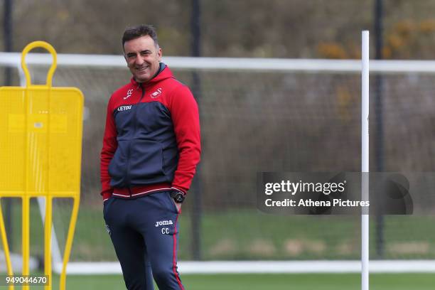 Manager Carlos Carvalhal watches his players train during the Swansea City Training at The Fairwood Training Ground on April 19, 2018 in Swansea,...