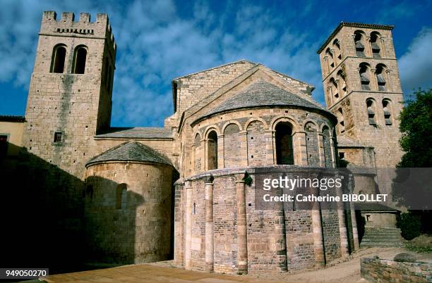 Caunes village, in the Minervois. The foot of the 11th century abbey and its two bell-towers . Pays cathare: le village de Caunes, dans le Minervois....
